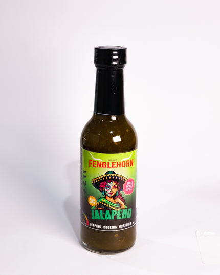 Bottle of Fenglehorn Jalapeno hot sauce on a white background
